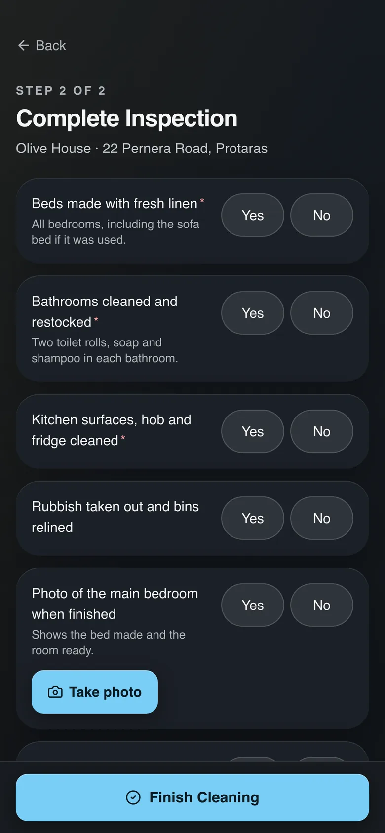 A cleaner's checklist on a phone, with a photo step